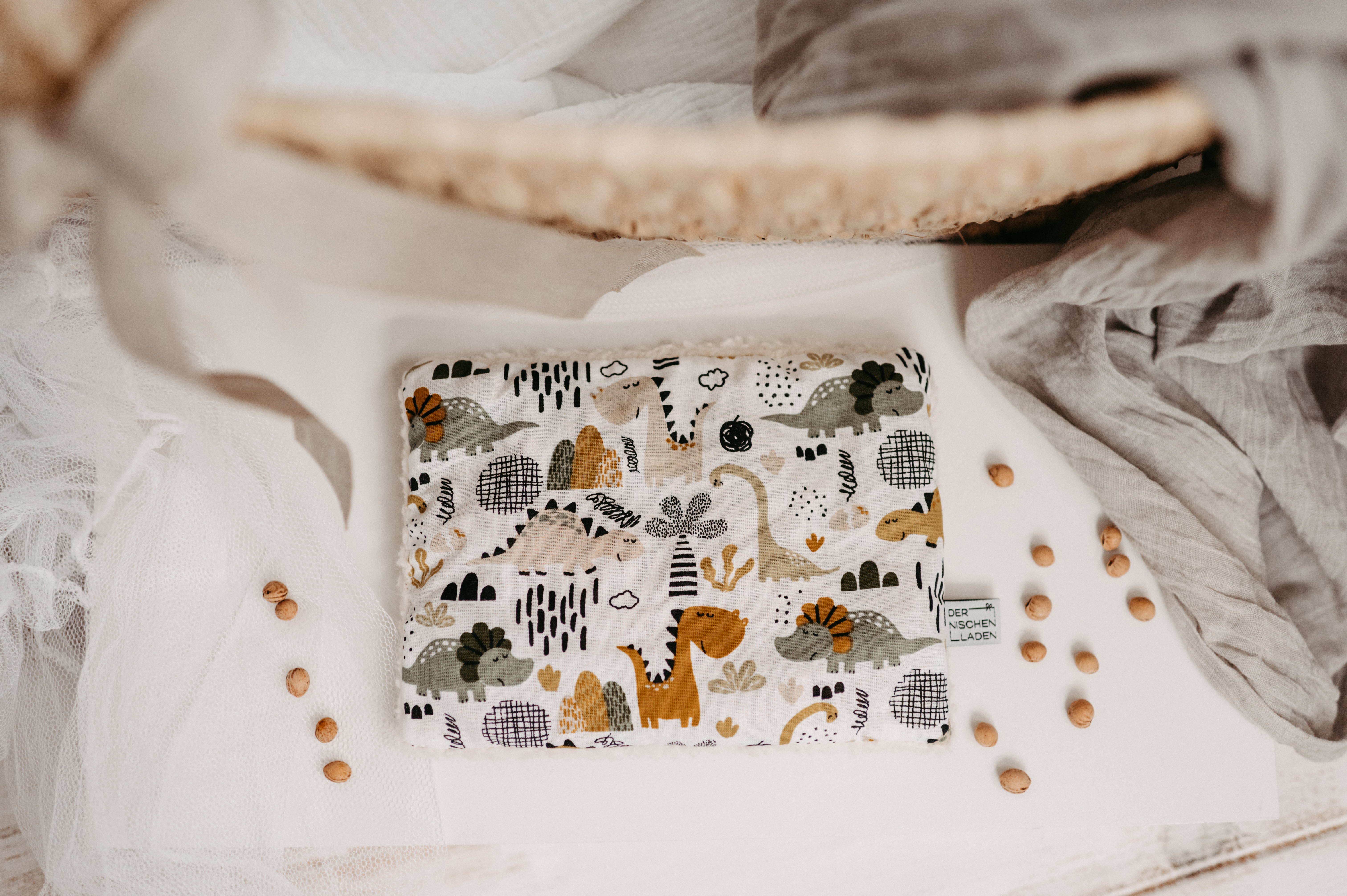 Kirschkernkissen Dinos grün/gelb Kirschkernkissen Dinos grün/gelb