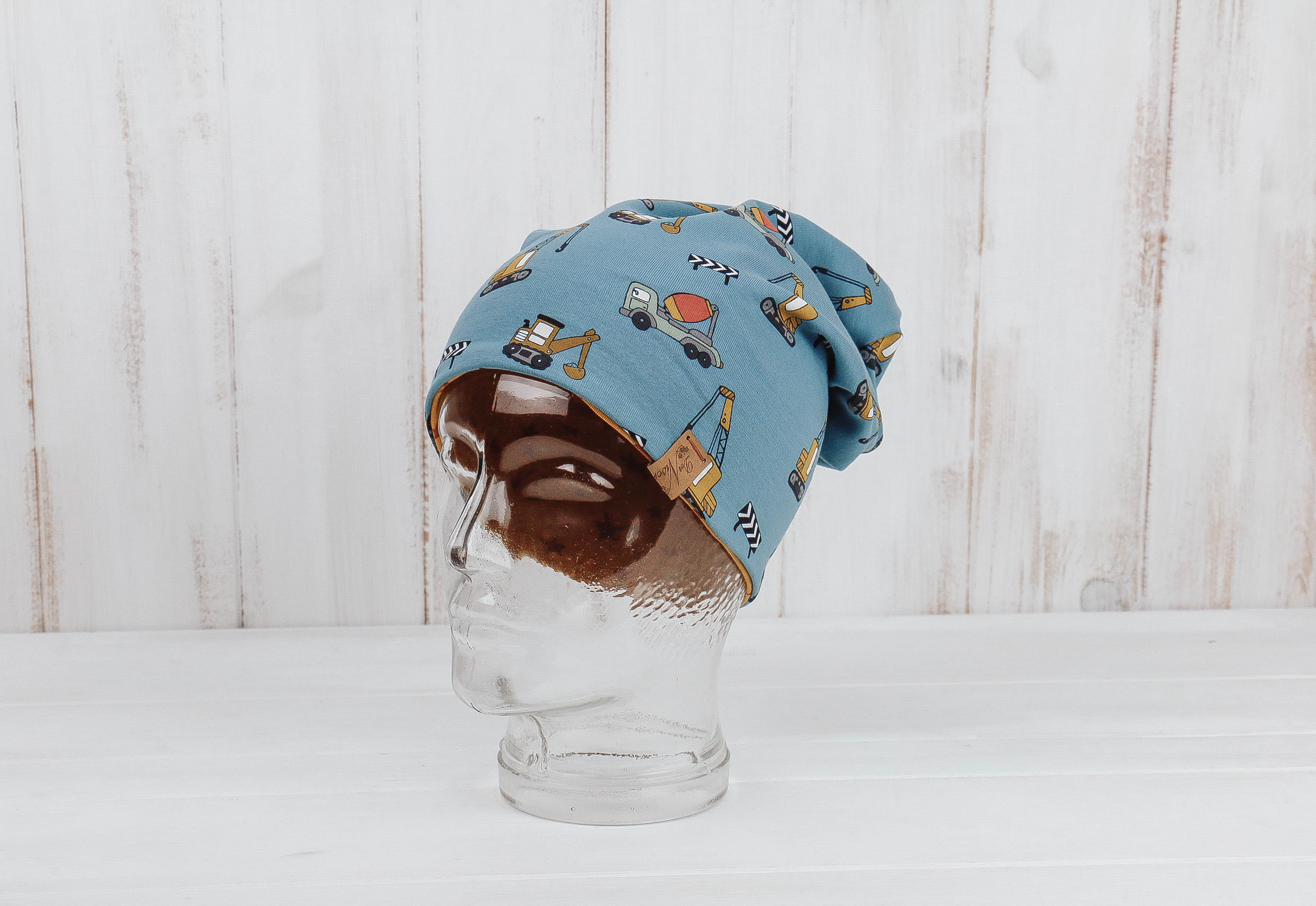 IMG_9549 Jersey Haube *Baufahrzeuge blau/ocker*