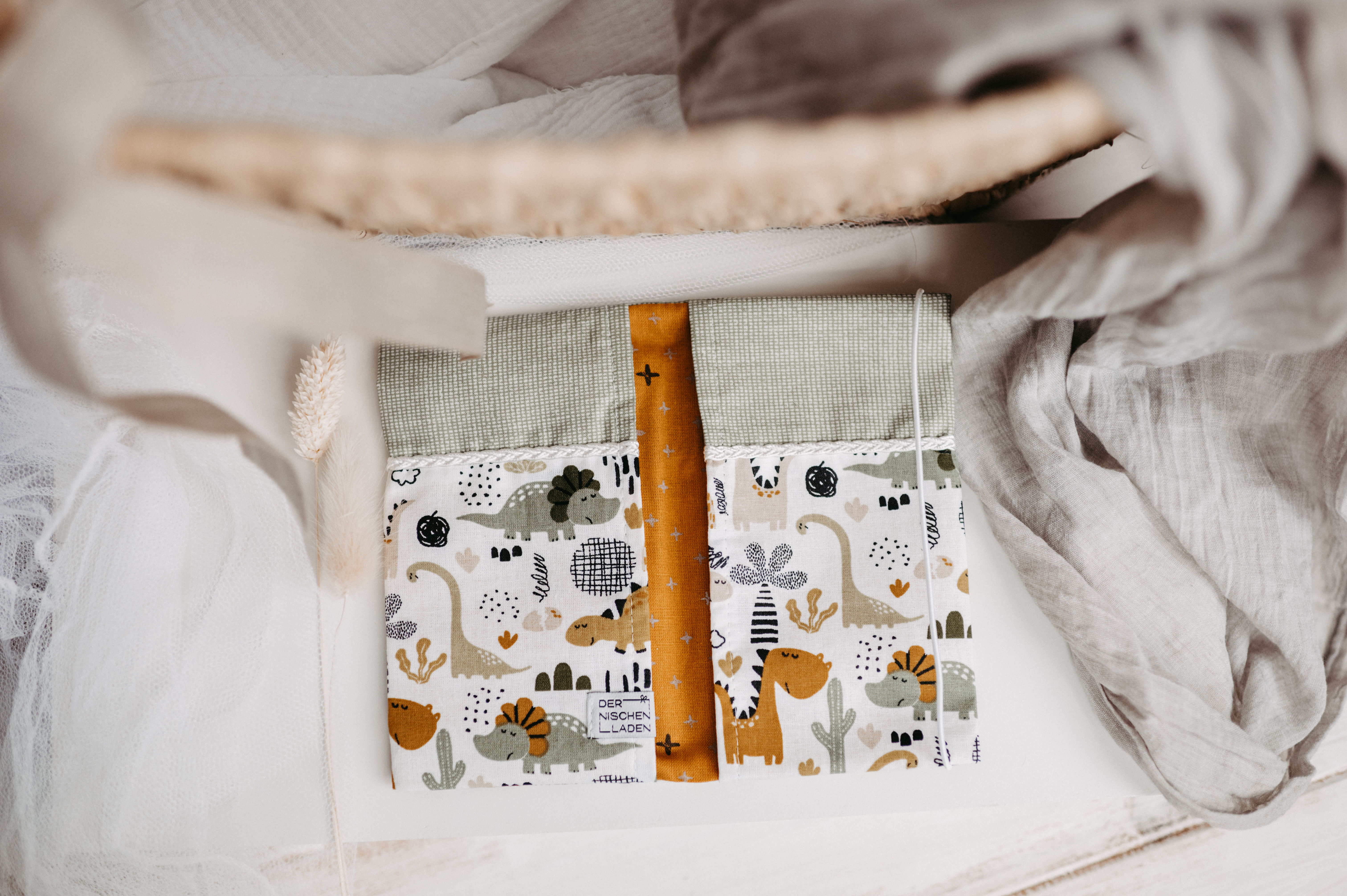 Mutter-Kind-Passhülle Dinos grün/gelb Mutter-Kind-Passhülle Dinos grün/gelb