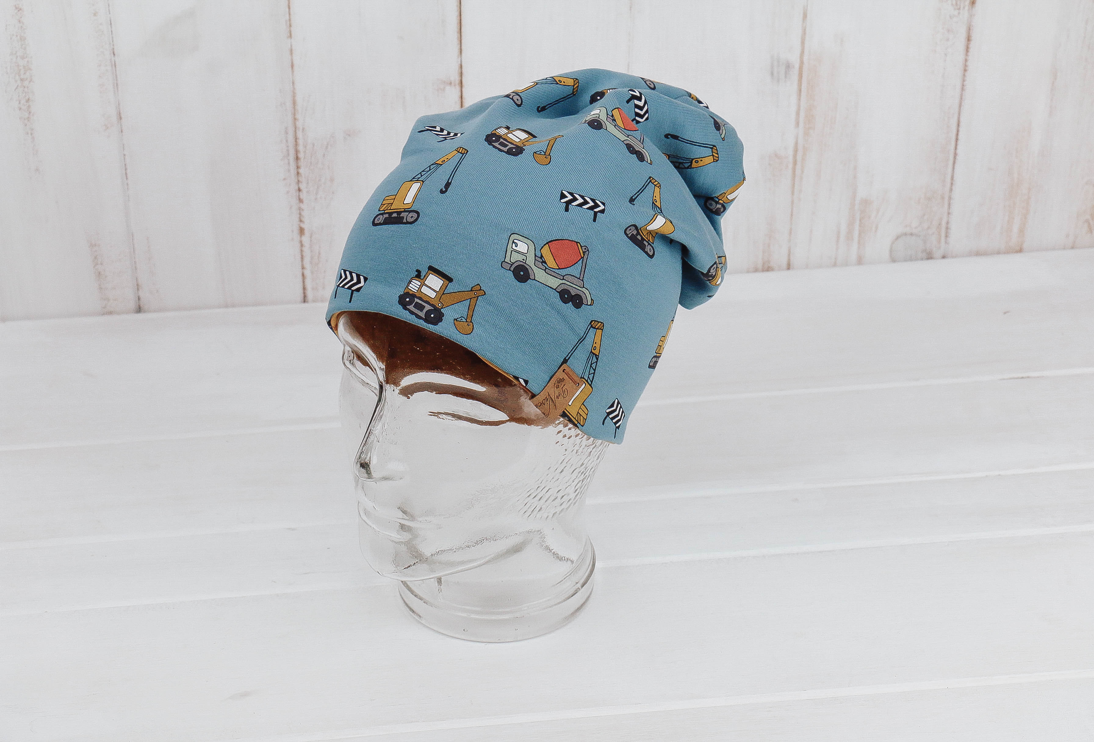 IMG_9550 Jersey Haube *Baufahrzeuge blau/ocker*